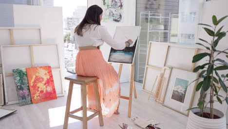 back of woman, painter and painting canvas in art