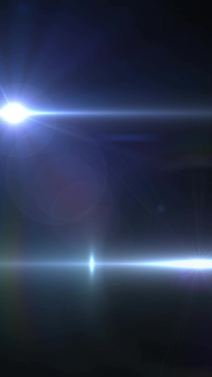 Animazione di due fasci di luce bianca che si muovono su sfondo nero.