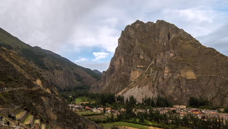 time lapse of ollantaytambo inca ruins, tourists going up and down, peru