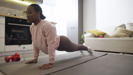 woman stretching at home