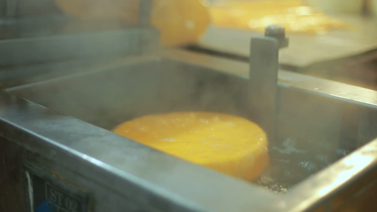 Cheese packaging process. Production food. Cheese factory manufacturing process