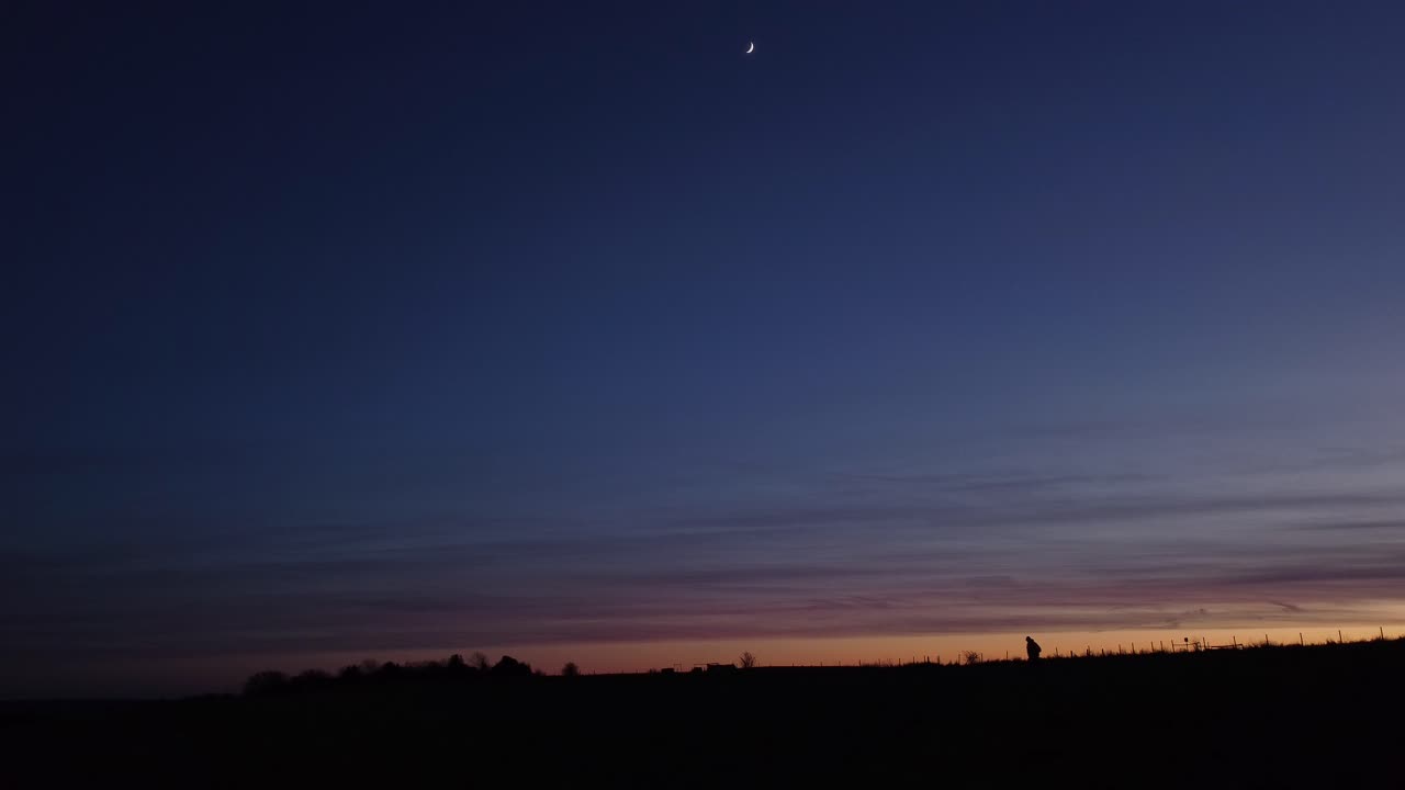 Lone Man Silhouette Walking After Dusk.