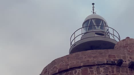 capture of faro de camarinal, time-tested 16th-century lighthouse constructed on a beacon tower with a spiral staircase and views