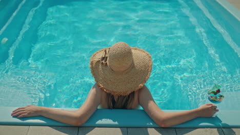 woman relaxing in a swimming pool