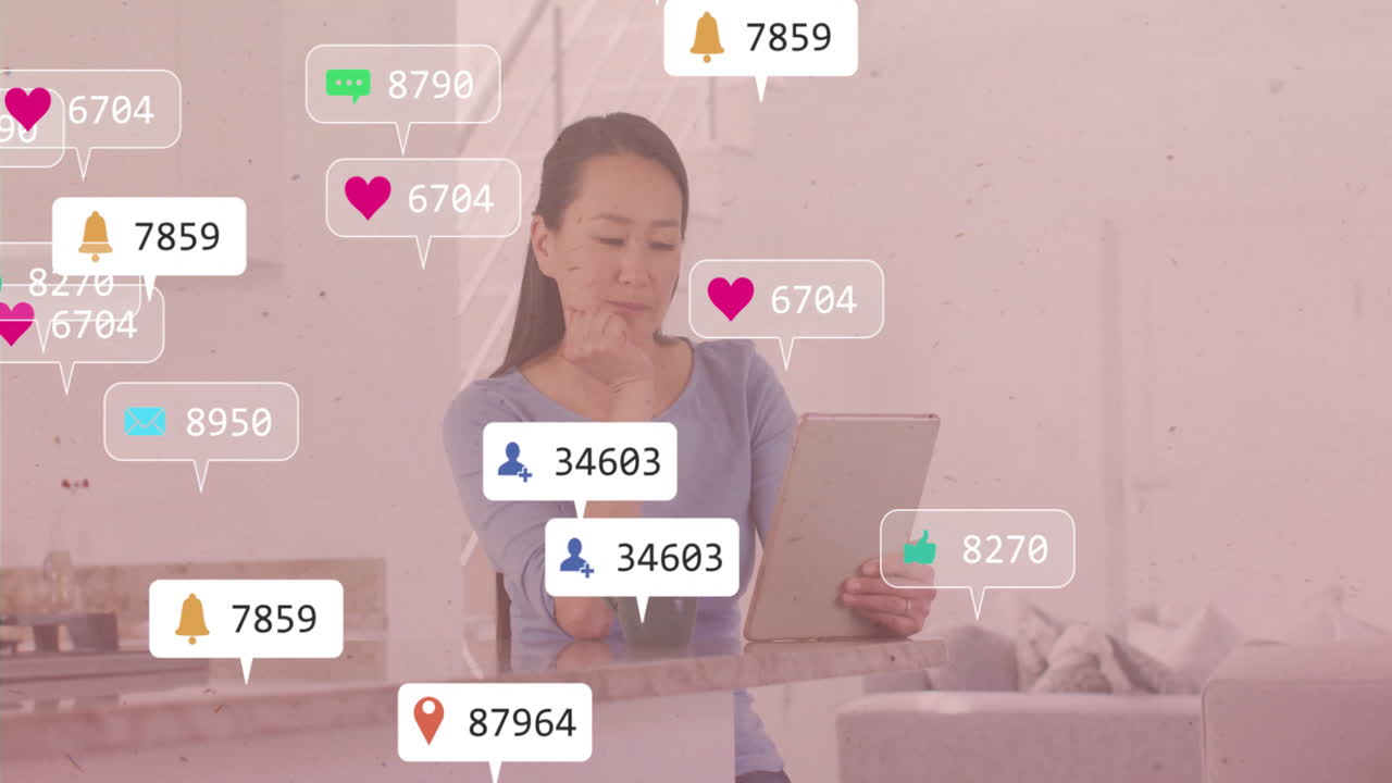 Using tablet, woman surrounded by animation of social media notification icons