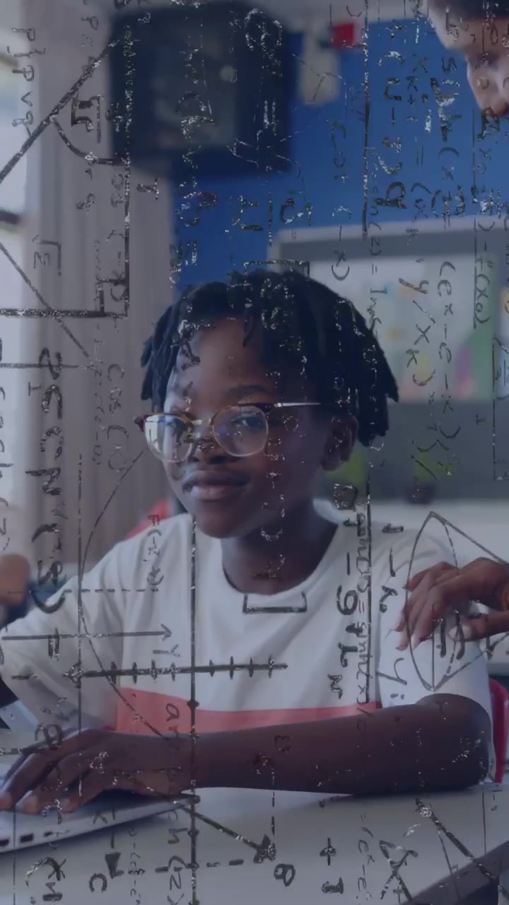 Vertical video: Boy typing on PC learning math as TA hand reaching causing glance graphs overlaying