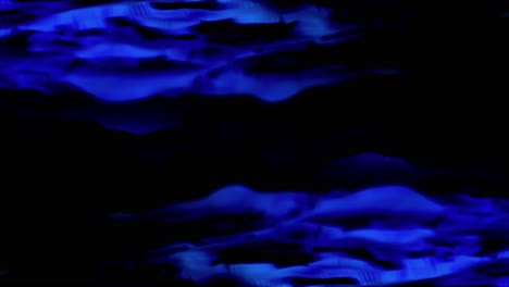 abstract blue waves on black background