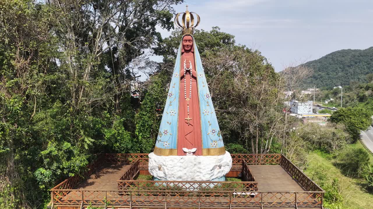 Religious Symbol Of Mongagua In Sao Paulo Brazil. Religious Skyline. Downtown Cityscape. Our Lady Of Aparecida Saint. Religious Symbol At Mongagua In Sao Paulo Brazil. Patron Saint Hill