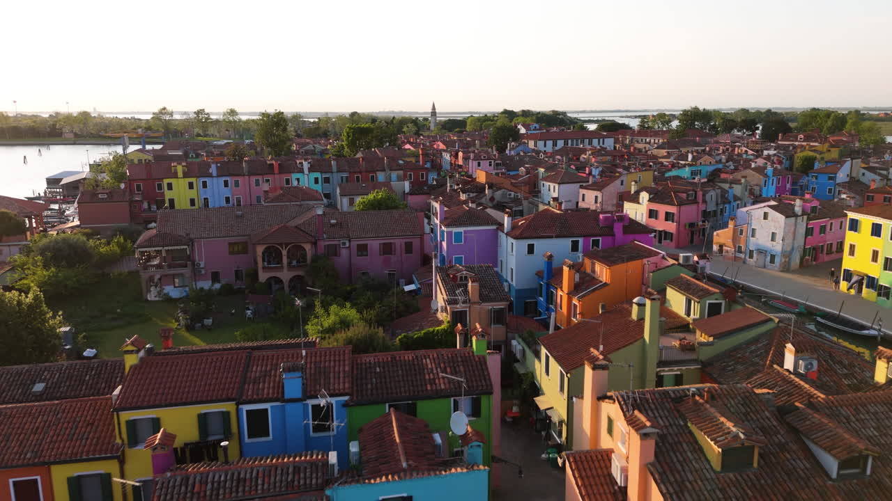 Fly Over Vibrant Colorful Houses Of Burano Island During Sunset In Venice, Italy. Aerial Drone Shot