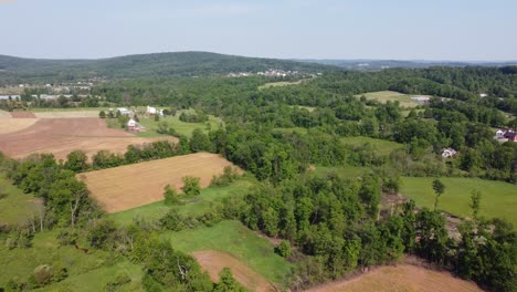 flying over the forested countryside of the state of pennsylvania