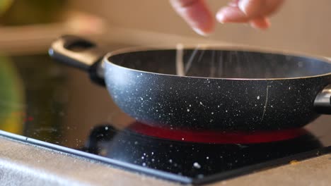 empty pan on a hot cooktop