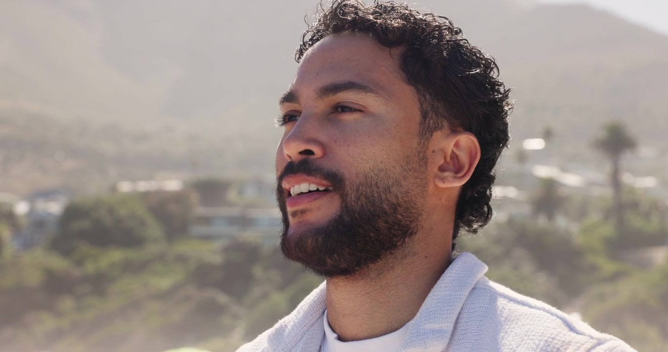 Young Man Practicing Mindfulness and Deep Breathing Outdoors