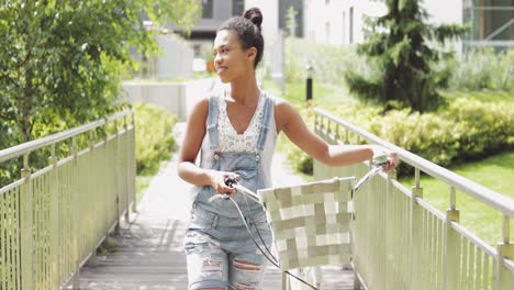 young girl walking with bicycle