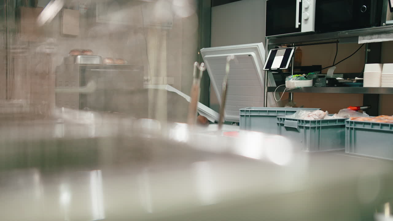 A person in a kitchen environment