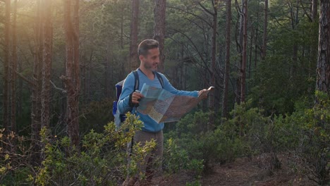 male traveler reading map