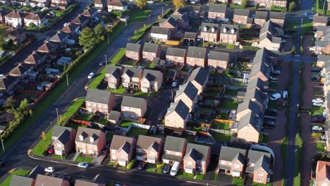 aerial view above new build modern housing estate property rooftops england right pan