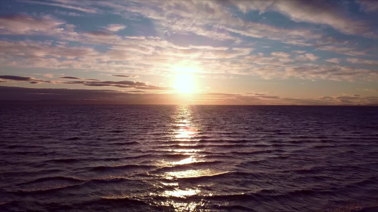 Sunset captured on the beach by drone