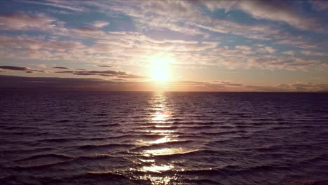 sunset captured on the beach by drone