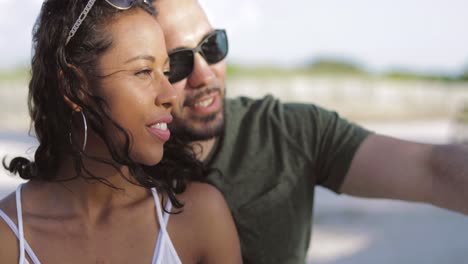 stylish diverse couple chilling outside