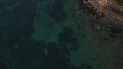 Drone-reveal-of-a-white-church-during-sunrise-in-Greece