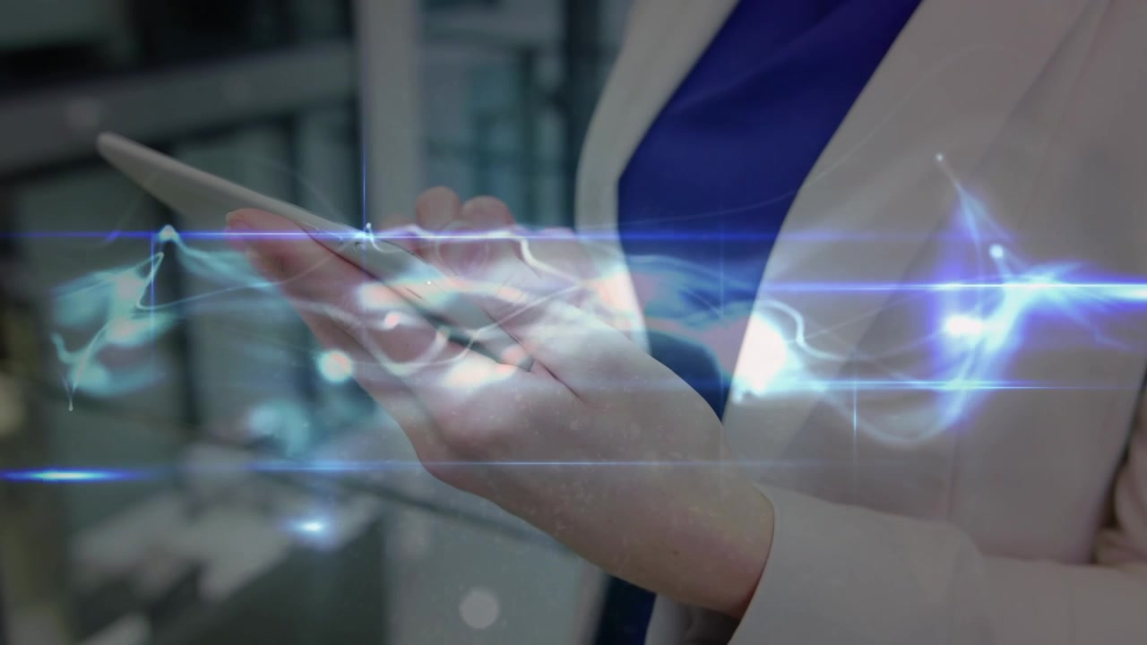 Animation of light trails over caucasian businesswoman in office