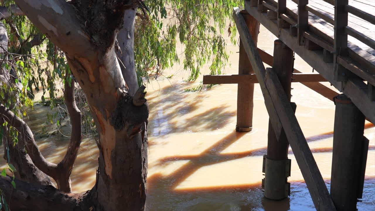 Bourke historic wharf on an over flowing Darling River, NSW Australia