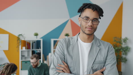 confident young professional in modern office