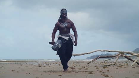 a muscular, dark-skinned man, authentically portraying nekharis in cosplay, graces a tropical beach