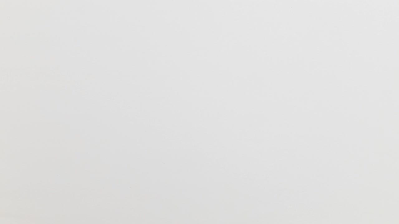 Stop Motion Animation_White paper ball unwrapping on yellow background