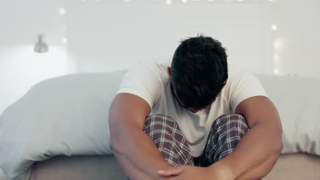 Sad,-anxiety-and-stress-with-man-in-bedroom