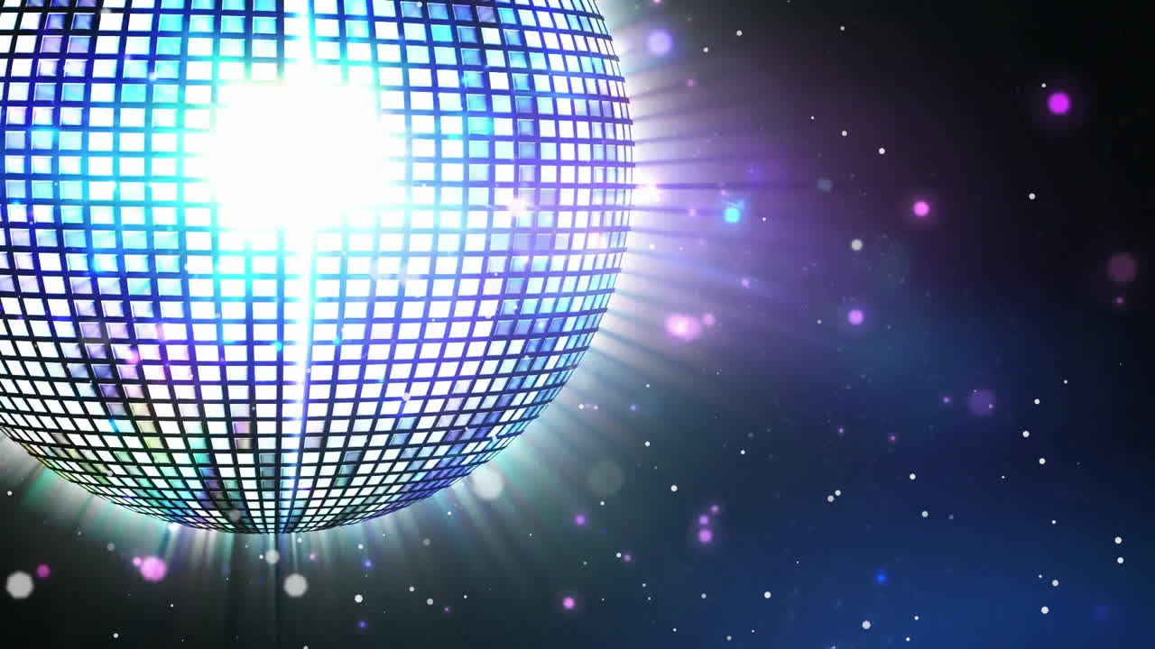 Animation of glowing spots of light and disco ball spinning on black background