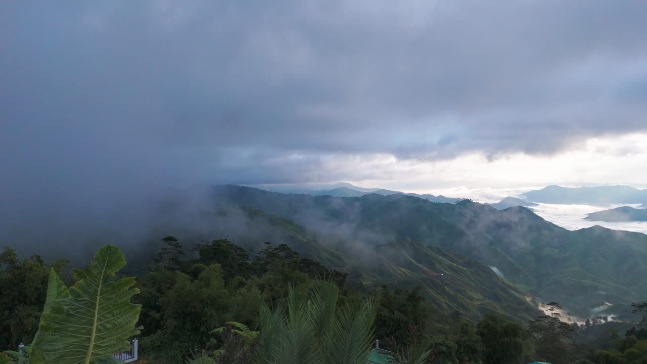 Dramatic aerial drone footage of misty mountains and rolling clouds in the Philippines. Perfect for cinematic, travel, and nature projects