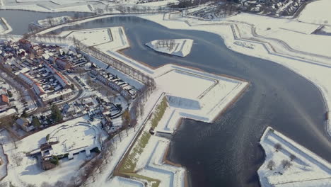 aerial drone shot of the snowy landscape in the winter