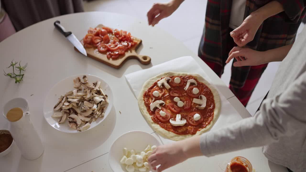Preparing homemade pizza with fresh ingredients