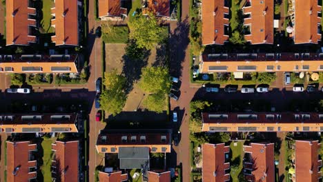 aerial over the roofs of an amsterdam social neighborhood in noord