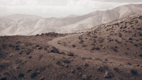 winding desert road in mountains