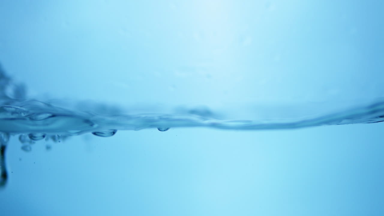 Abstract Close-up of Water Surface with Bubbles