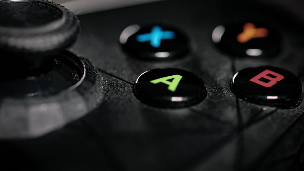 Modern gamepad on a dark. Game controller close-up.