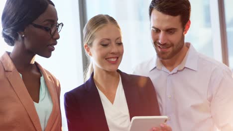 businesspeople interacting over mobile phone