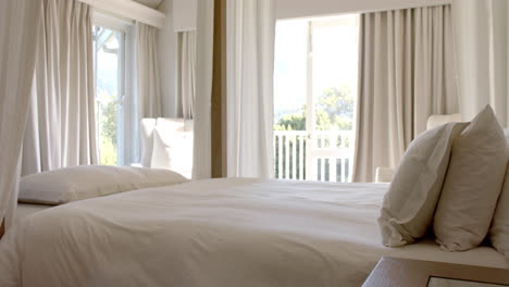 sunlight filtering through open balcony doors, illuminating room, copy space