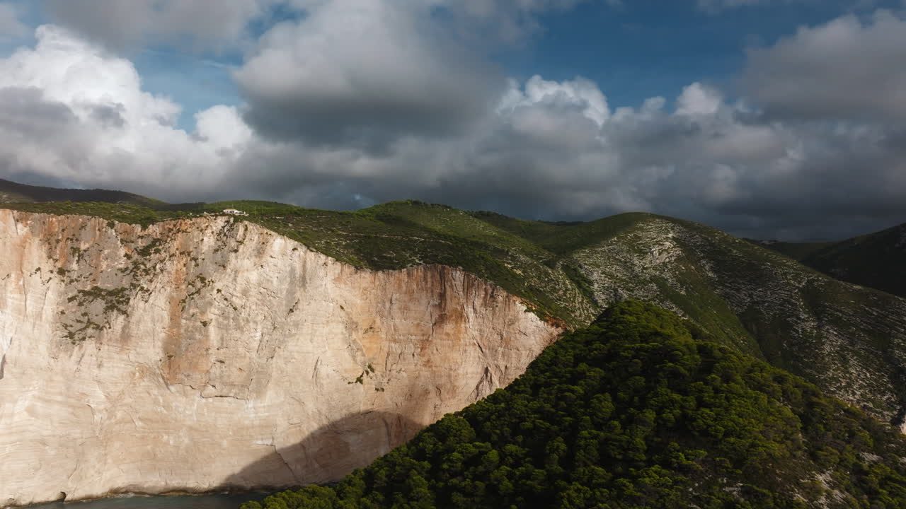 Dramatic Cliffs and Clouds over a Coastal Landscape