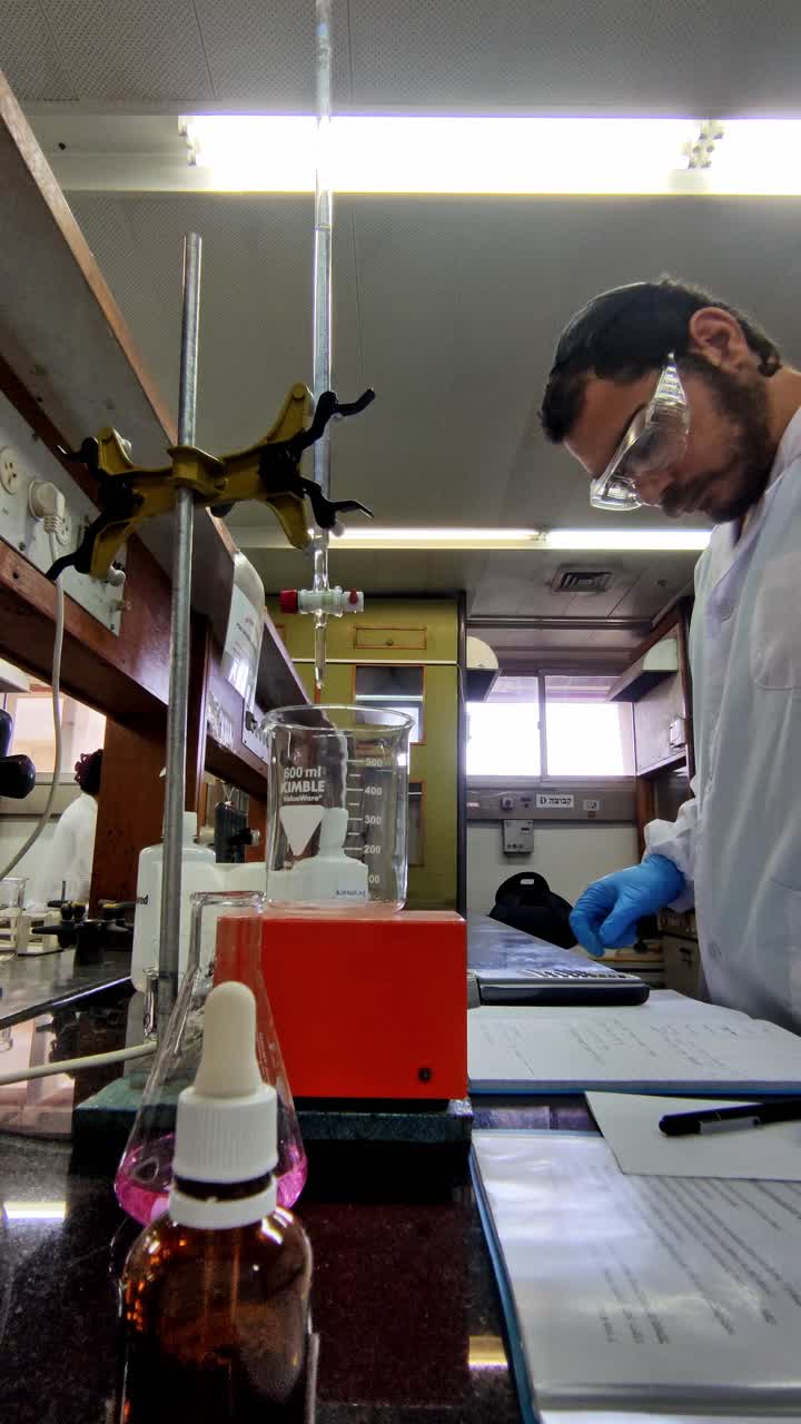 Scientist with Binder in Laboratory Setting