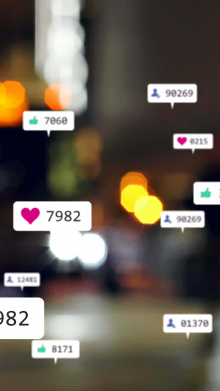 Animation of social media icons and numbers over out of focus city and car lights