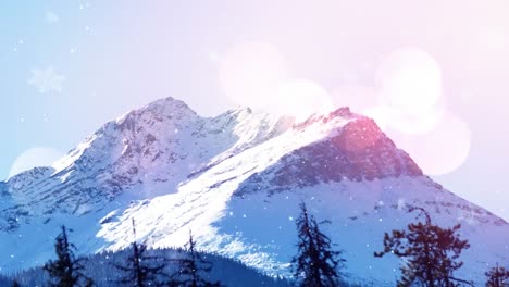 animación de puntos de luz sobre la nieve que cae y el paisaje de invierno