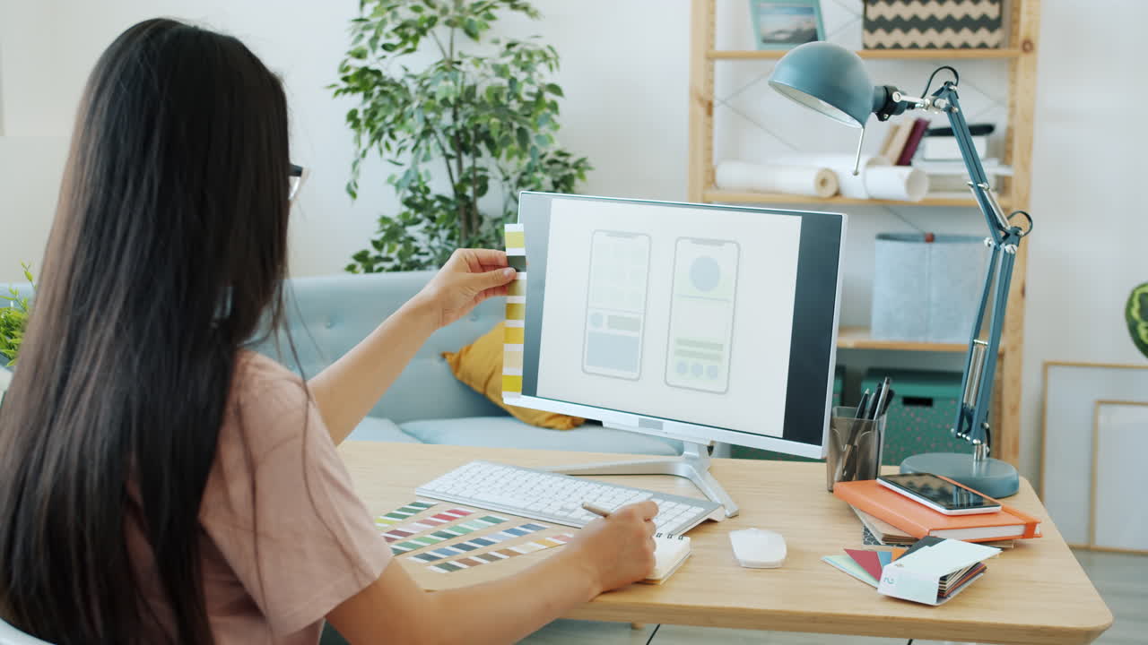 Woman Designer Working on Mobile App Design