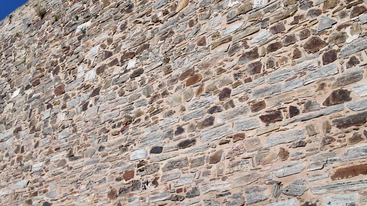Detailed view of ancient castle wall textures in monsaraz portugal