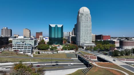 Downtown-skyline-of-Winston-Salem,-North-Carolina-against-bright-blue-sky