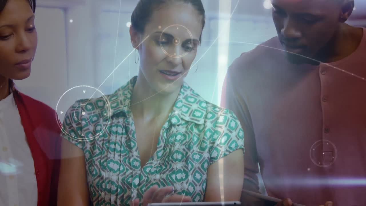 Glowing network of connections against diverse office colleagues using digital tablet at office