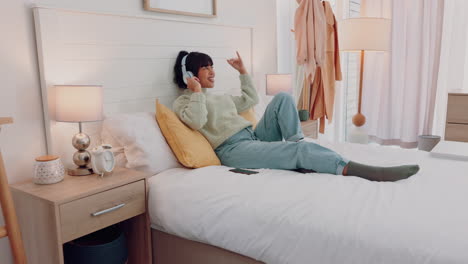 Woman,-music-headphones-and-dance-in-bedroom