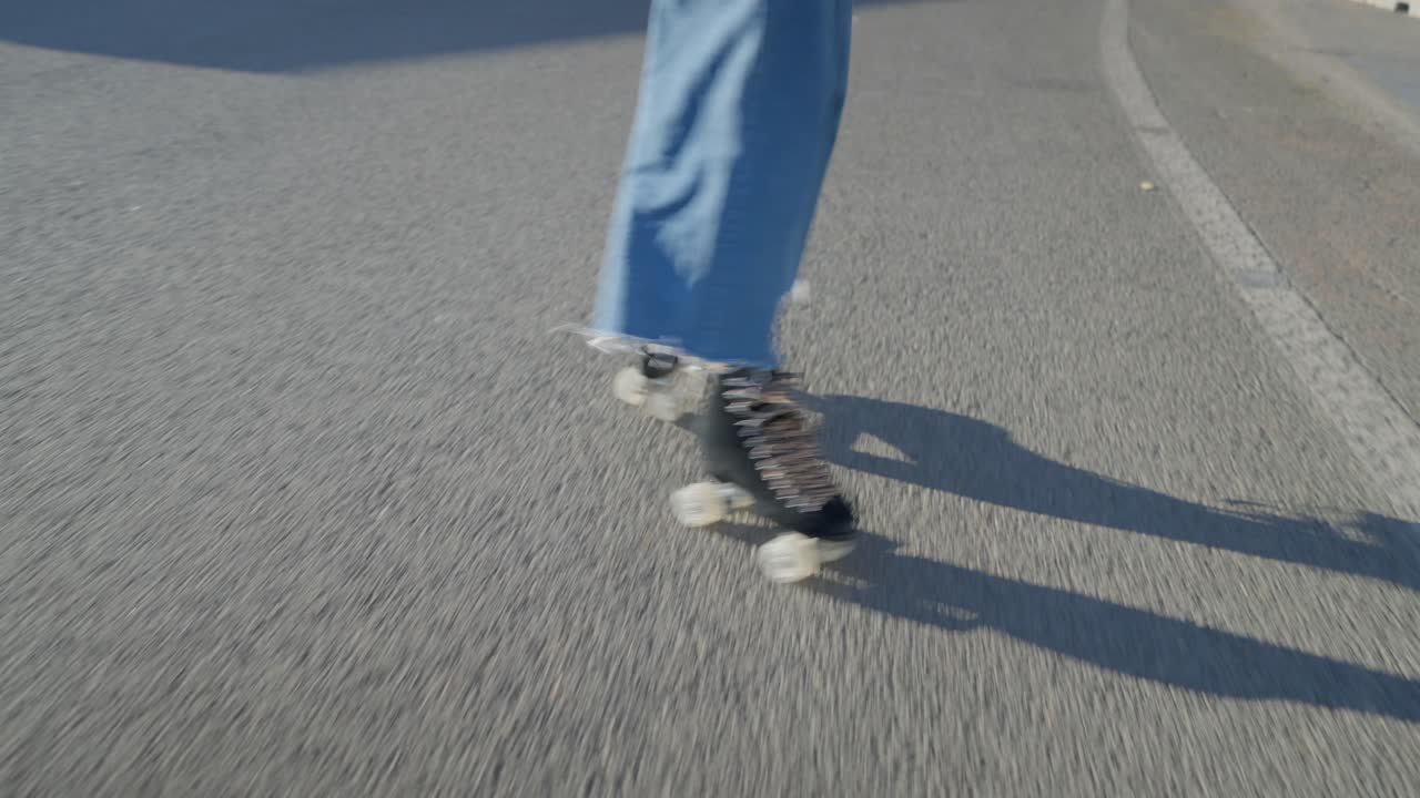 Woman Roller Skating on the Street